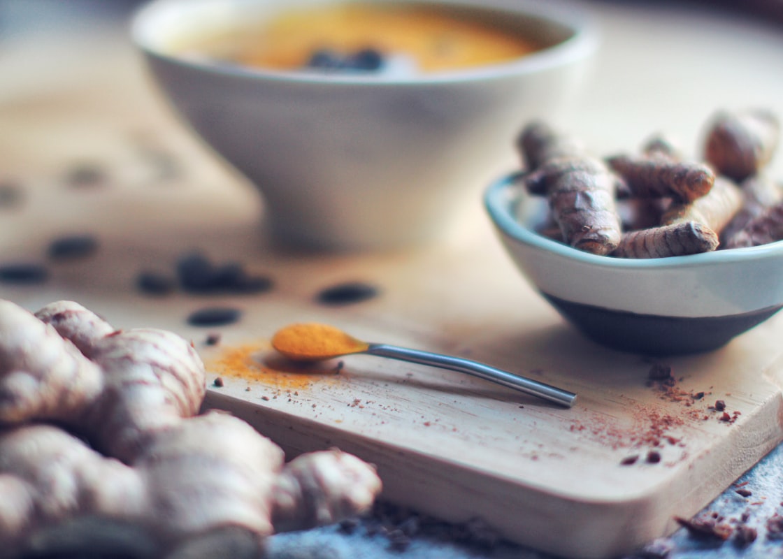 Black peppercorns in bowl