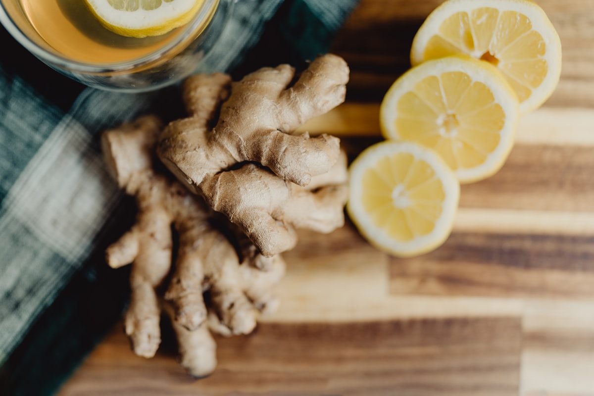 Fresh turmeric root with golden powder
